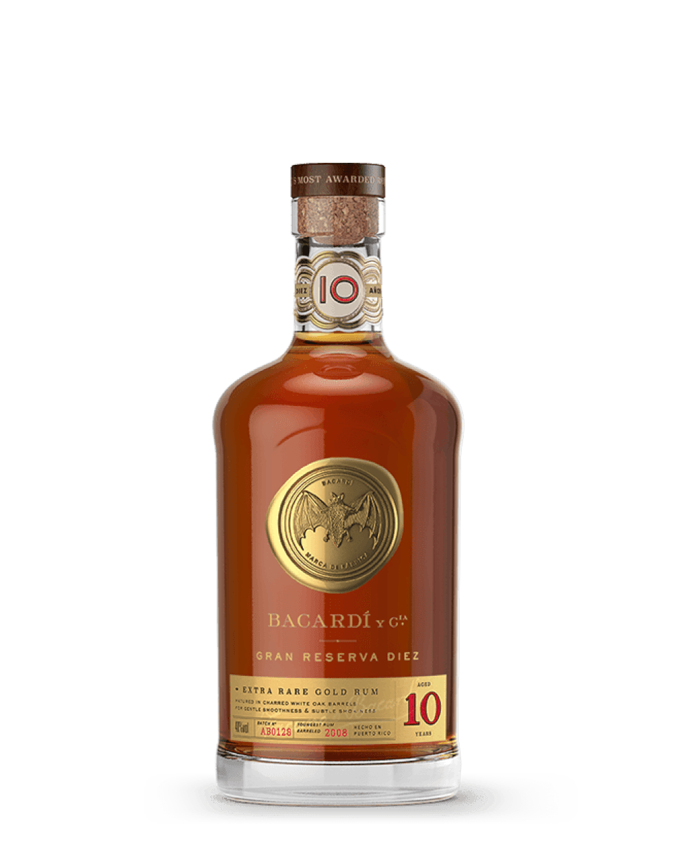 BACARDÍ Gran Reserva Diez rum bottle with gold medallion, cork stopper, displaying '10 Years' aged label.