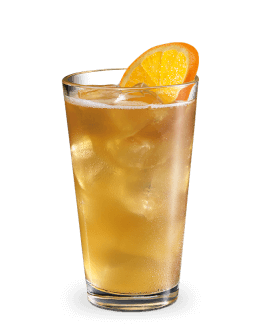 Tall glass with amber cocktail, ice, garnished with bright orange slice.