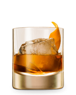 Old Fashioned cocktail in a rocks glass with large ice cube and orange peel garnish.