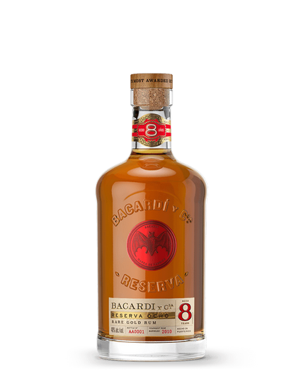BACARDÍ Reserva Ocho rum bottle with red and gold label, cork stopper, displaying amber-colored liquid.