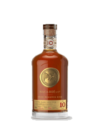 BACARDÍ Gran Reserva Diez rum bottle with amber liquid and clear base.
