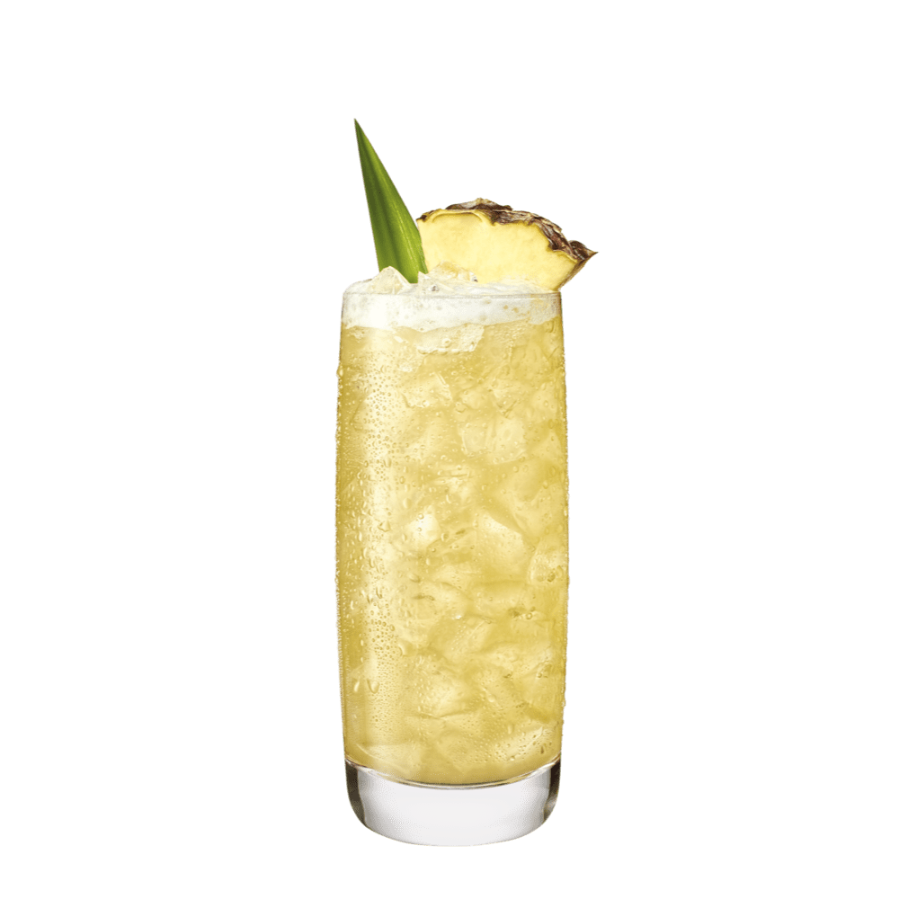 Pale yellow cocktail in a highball glass with crushed ice, pineapple wedge, and leaf.