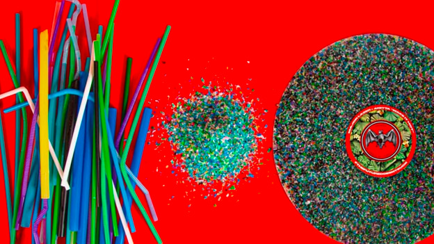 Progression of recycled plastic: colored straws, shredded flakes, and a vinyl record with BACARDÍ logo.